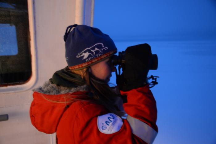 Katie Gavenu participating in Ice Watch aboard the Fedorov. Photo by Katy Human.