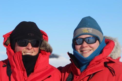 Heather Harris and Emma Weitzner in the field sporting their sunglasses