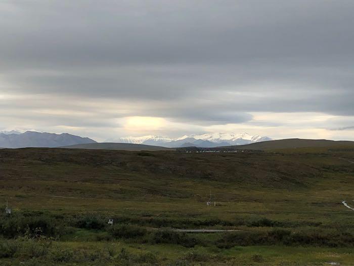 Sun's rays hit the Brooks Range early in the morning