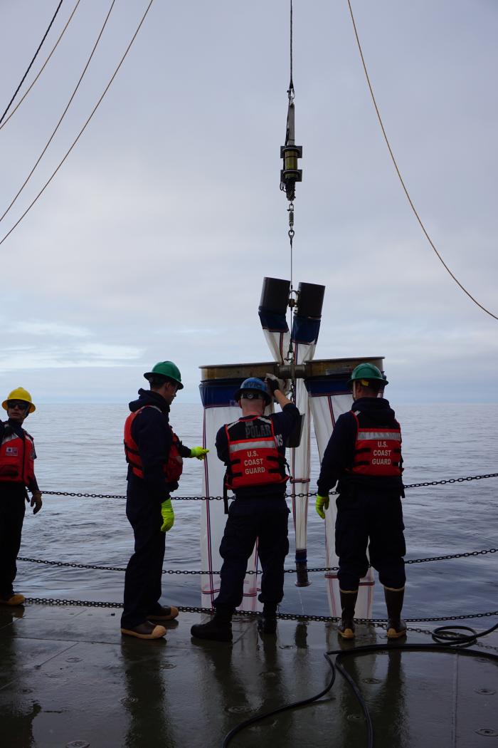 The bongo net is deployed by the Coast Guard crew on the back deck.