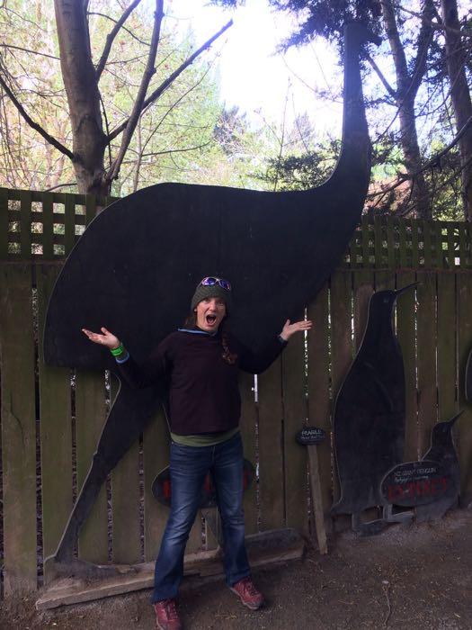 Amy in front of a cutout of the extinct Moa