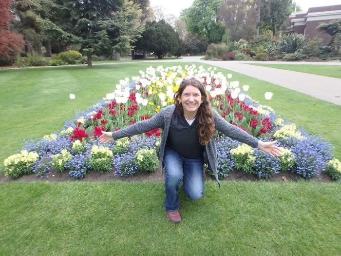 Amy Osborne with tulips in the Christchurch Botanic Gardens (Te Māra Huaota o Waipapa)