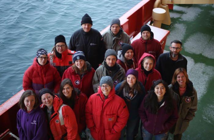 Almost all the members of the science team aboard the Nathaniel B. Palmer icebreaker gather for a midnight photo.