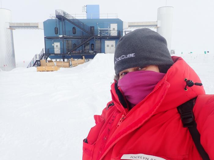 Jocelyn standing in front of the IceCube Lab