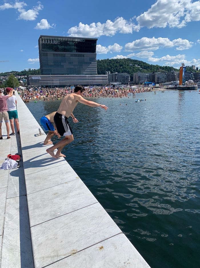 Xander and Mark diving into the water