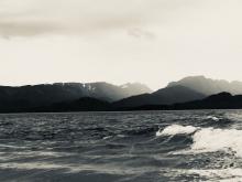 Bay with mountains. Kachemak Bay is my home. Keeping our lands and ocean healthy is an important part of fighting climate change. And these actions help us in other ways too. It is isn't always easy to figure out choices that will benefit the environment, but it is great to have clean water and air and ecosystems to live in and get our food from!  