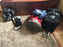 Two large bags and a daypack.  