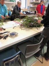 The group begins to harvest the shrubs and upper story.  