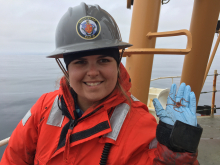 Piper Bartlett-Browne holds a brittle star.