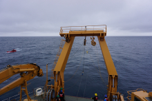 Recovery of sediment trap using the Coast Guard's small boat. 