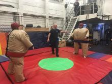 Sumo wrestling morale night in the hangar of the USCGC Healy.