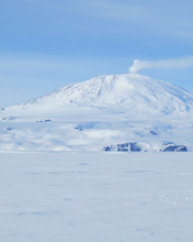 "A fairly significant plume of steam rising from Mt. Erebus." On the sea ice of the Ross Sea, Antarctica.