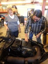 Denise Hardoy is ready to ride… with instructor Tony.