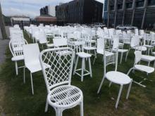 185 Empty white chairs memorial