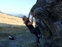 Amy Osborne climbing on a rock in Tiburon, California