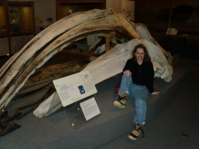 Alex sitting next to a Grey Whale Skull