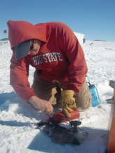 Marty setting up the Whisper Light Stove.  