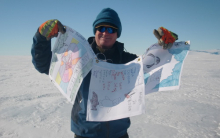 Bill holding flags