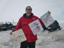 Gregg holding flags