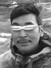 Inuit wearing goggles