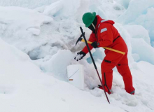 Tim Kenna sampling dirty ice