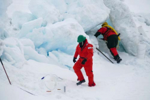 Tim Kenna and Dan Gomes sampling dirty ice