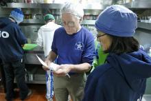 Chris Measures and Phoebe Lam Checking Recipe