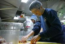 Yang Xiang and Andrew Barna Preparing Chicken