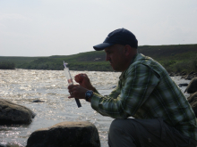 Bruce Taterka sampling the Sag River