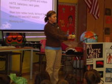 Chantelle showing the inside of a fleece lined rubber gloves.