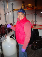 Ms. Rose stirs the bottle of seawater from the Nisken bottles