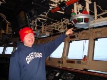 LTJG Weston Pointing out the heading of the Healy