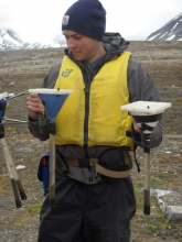 Greg holding onto a couple sediment traps.