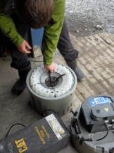 Simon with the ISCO auto water sampler he rebuilt.