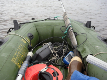 The boat with experimental equipment in a Karst Lake.