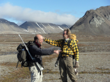 Our program directors pointing to the direction home.