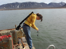 Kamilla checking the water temperature.