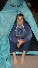 Claude camps out in her family room to get a feel for pitching her tent.