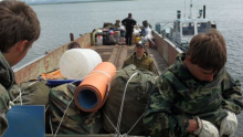 disembarking the barge for camp