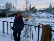 Cristina Solis standing next to the Chena River.