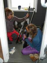 Hannah and Lauren cleaning rifles