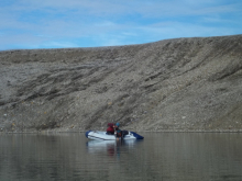 Lauren capping a sediment core from her karst lake.