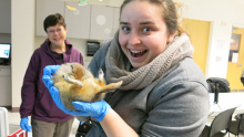 Kast holding a Squirrel