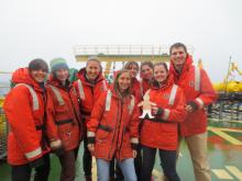 The students welcoming Flat Stanley aboard.