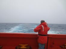 Bruce Huber releasing the first drift buoy at latitude 55