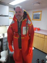 Me trying on my gumby or immersion suit.