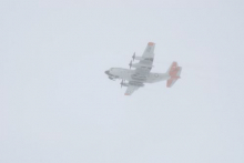 C-130 flying over Summit Station