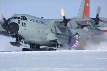 Hercules C-130 using rocket boosters