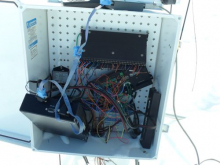 Open data box with damaged wires.