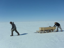 Pushing sled with BSRN tripod box.